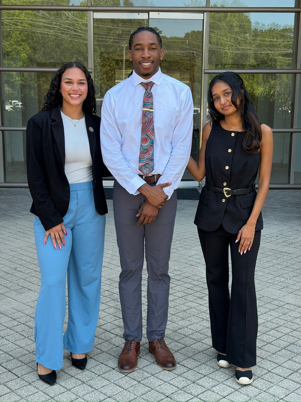 Three Luxuriate Management representatives before heading out to meet customers